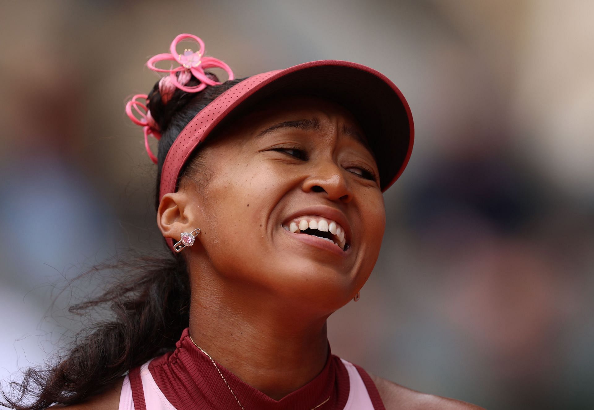 Naomi Osaka reacts during her first-round clash against Paula Badosa at the 2025 French Open (Source: Getty)